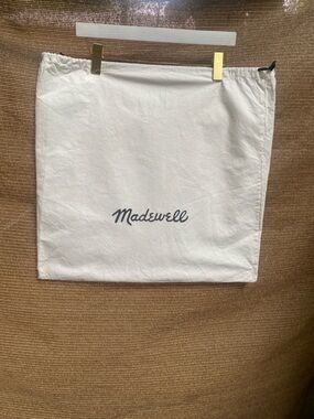 Madewell  White Cotton Dust Bag
Measures 21 x 20 inches
